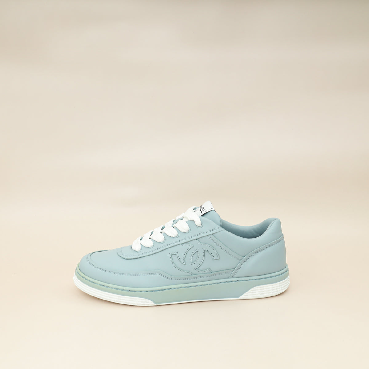 Chanel Light Blue CC Sneaker 38.5 – THE CLOSET