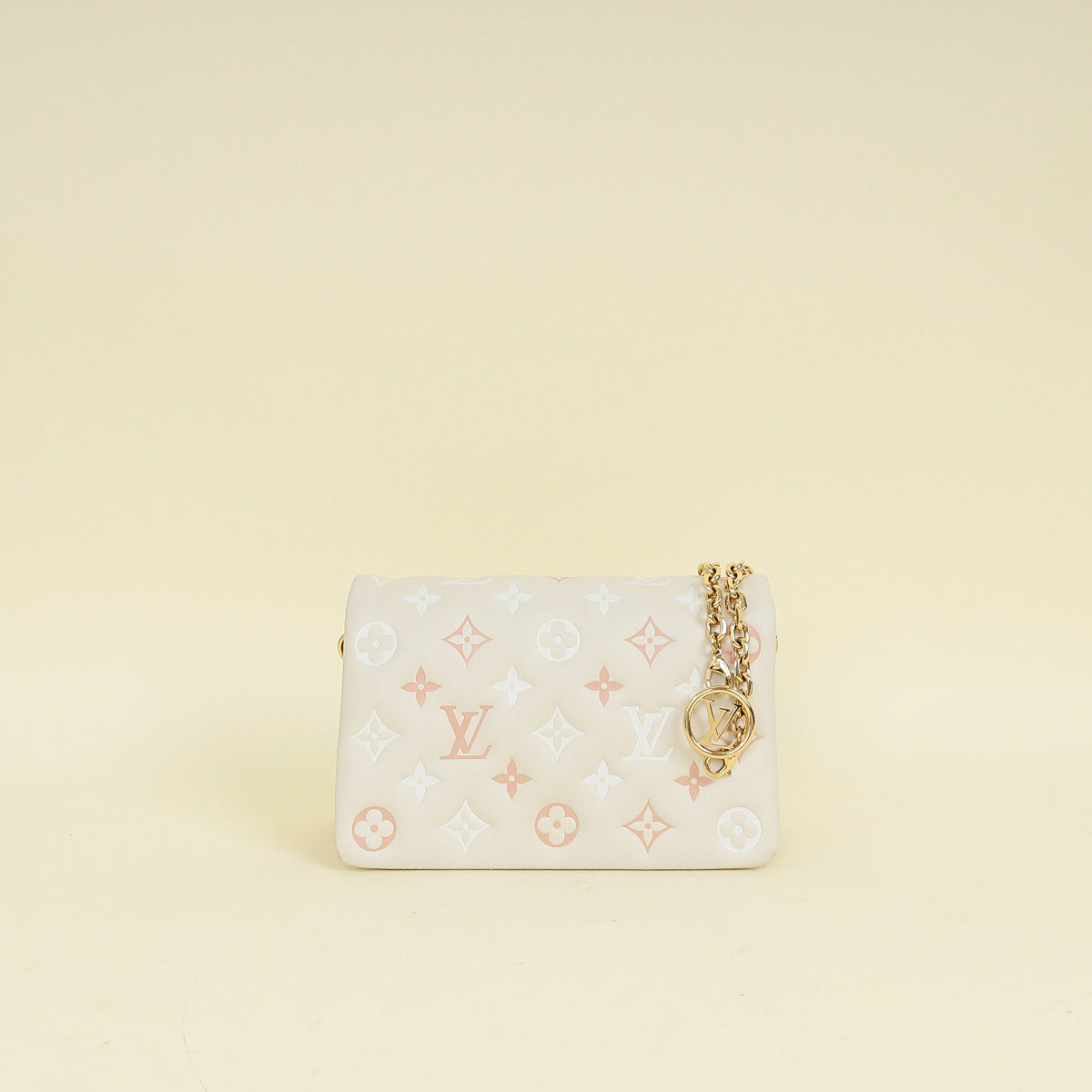 Louis Vuitton Creme Monogram-Embossed Pochette Coussin Bag – THE