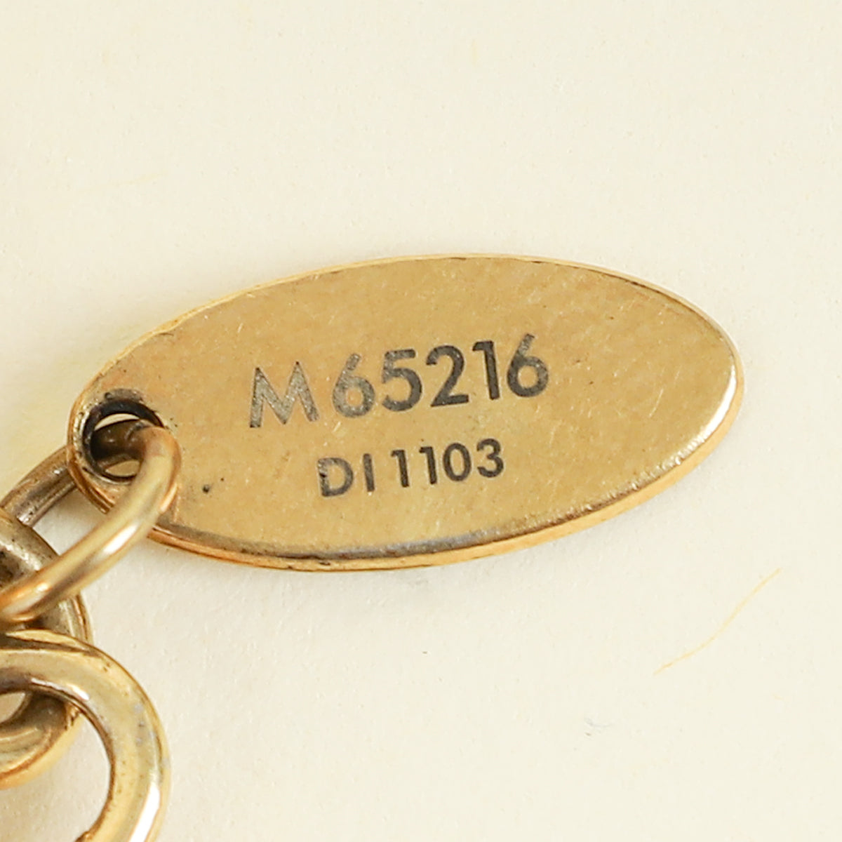 Louis Vuitton Gold Finish Facettes Key Holder Bag Charm – THE CLOSET