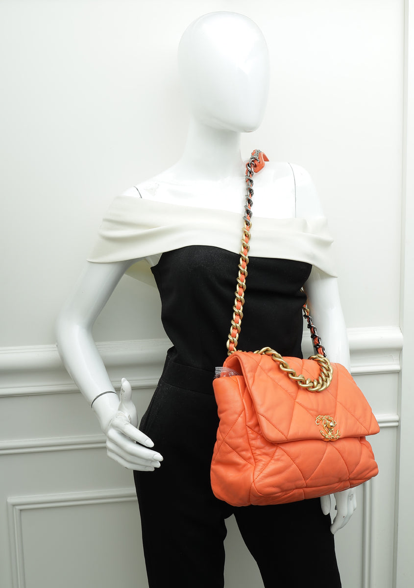 Chanel 19 handbag Shiny lambskin goldtone silvertone   rutheniumfinish metal orange  Fashion  CHANEL