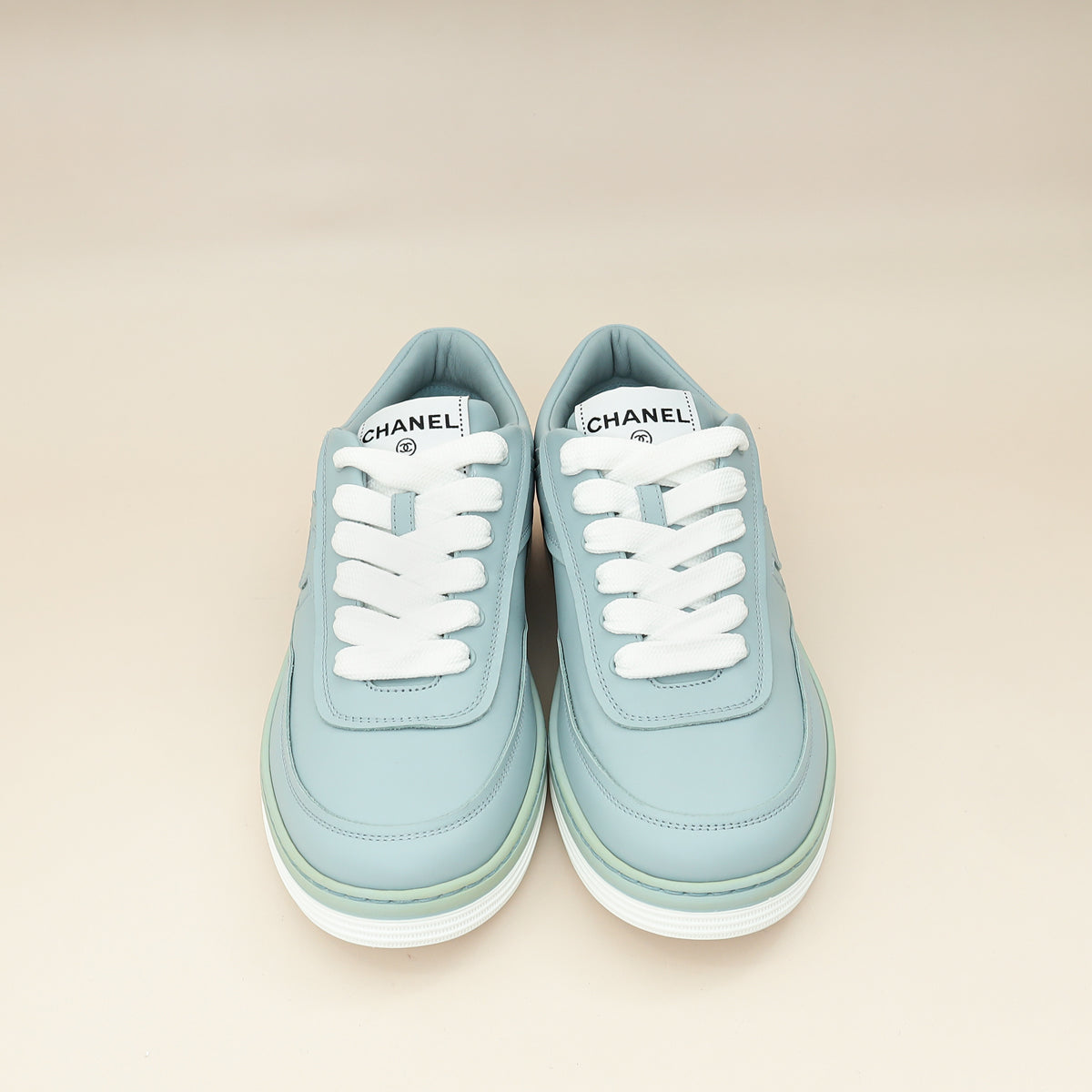 Chanel Light Blue CC Sneaker 38.5 – THE CLOSET