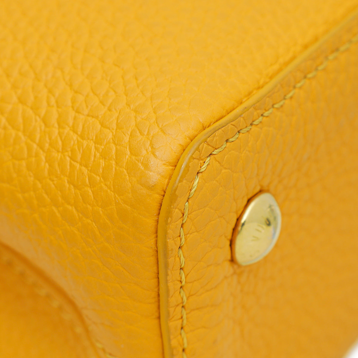 Louis Vuitton Resort 2015 Mini Capucine bag in yellow.
