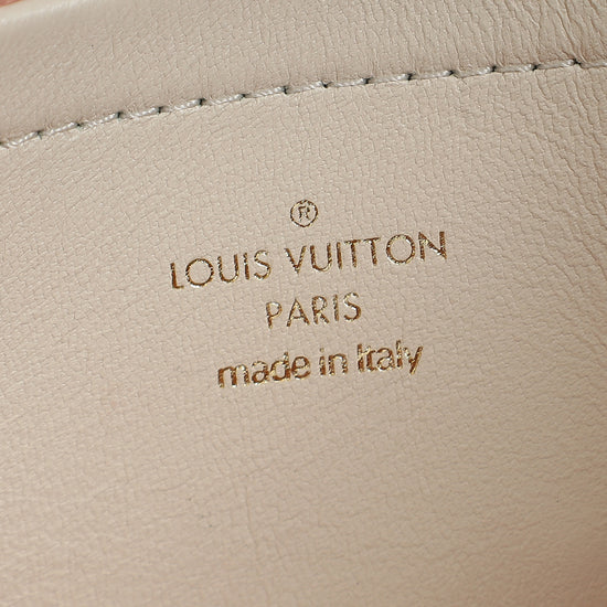 Louis Vuitton Creme Monogram-Embossed Pochette Coussin Bag