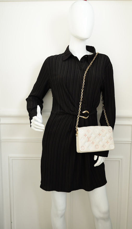 Louis Vuitton Creme Monogram-Embossed Pochette Coussin Bag