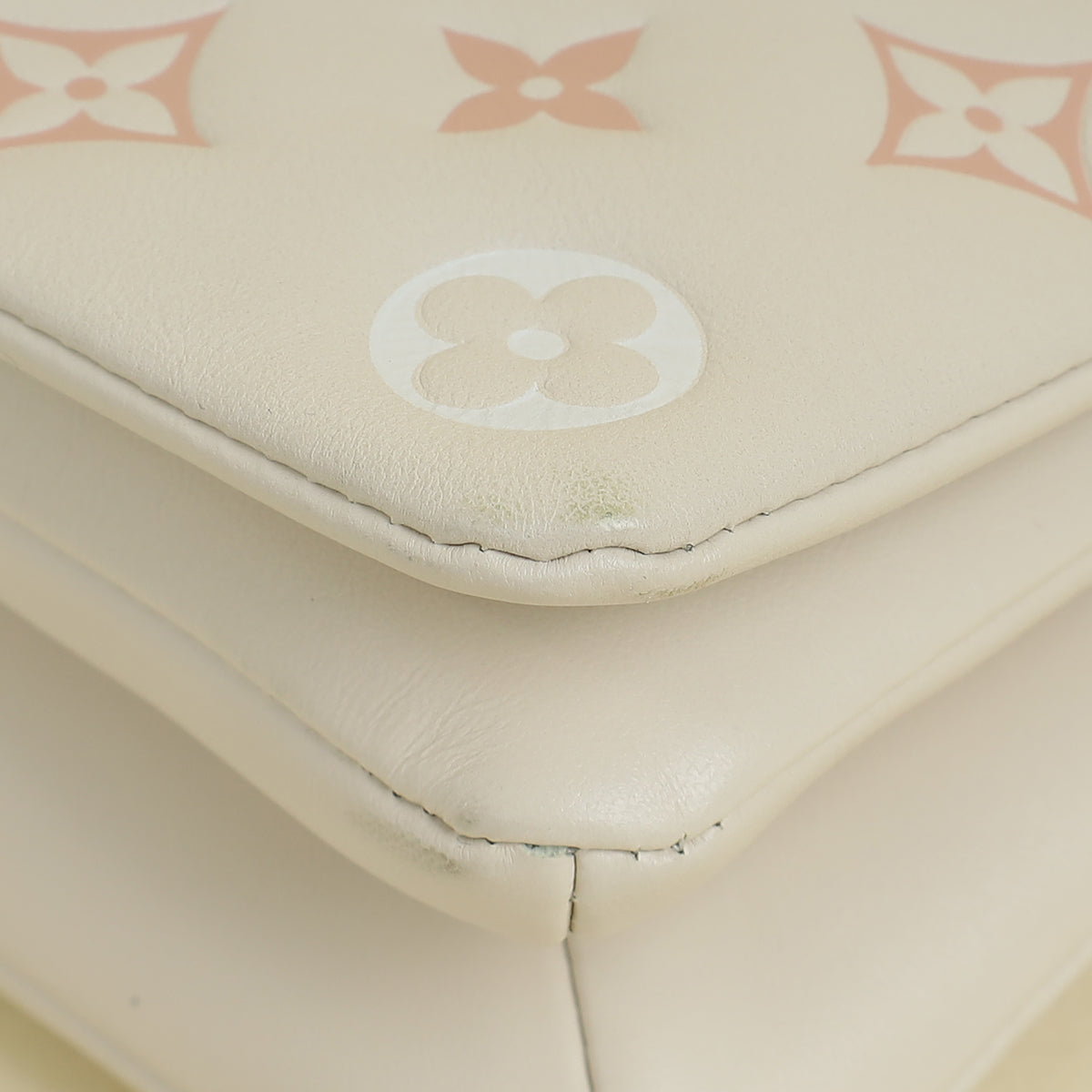 Louis Vuitton Creme Monogram-Embossed Pochette Coussin Bag