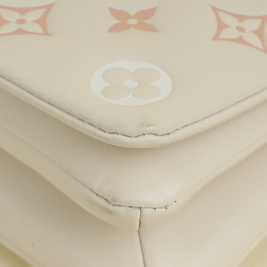 Louis Vuitton Creme Monogram-Embossed Pochette Coussin Bag
