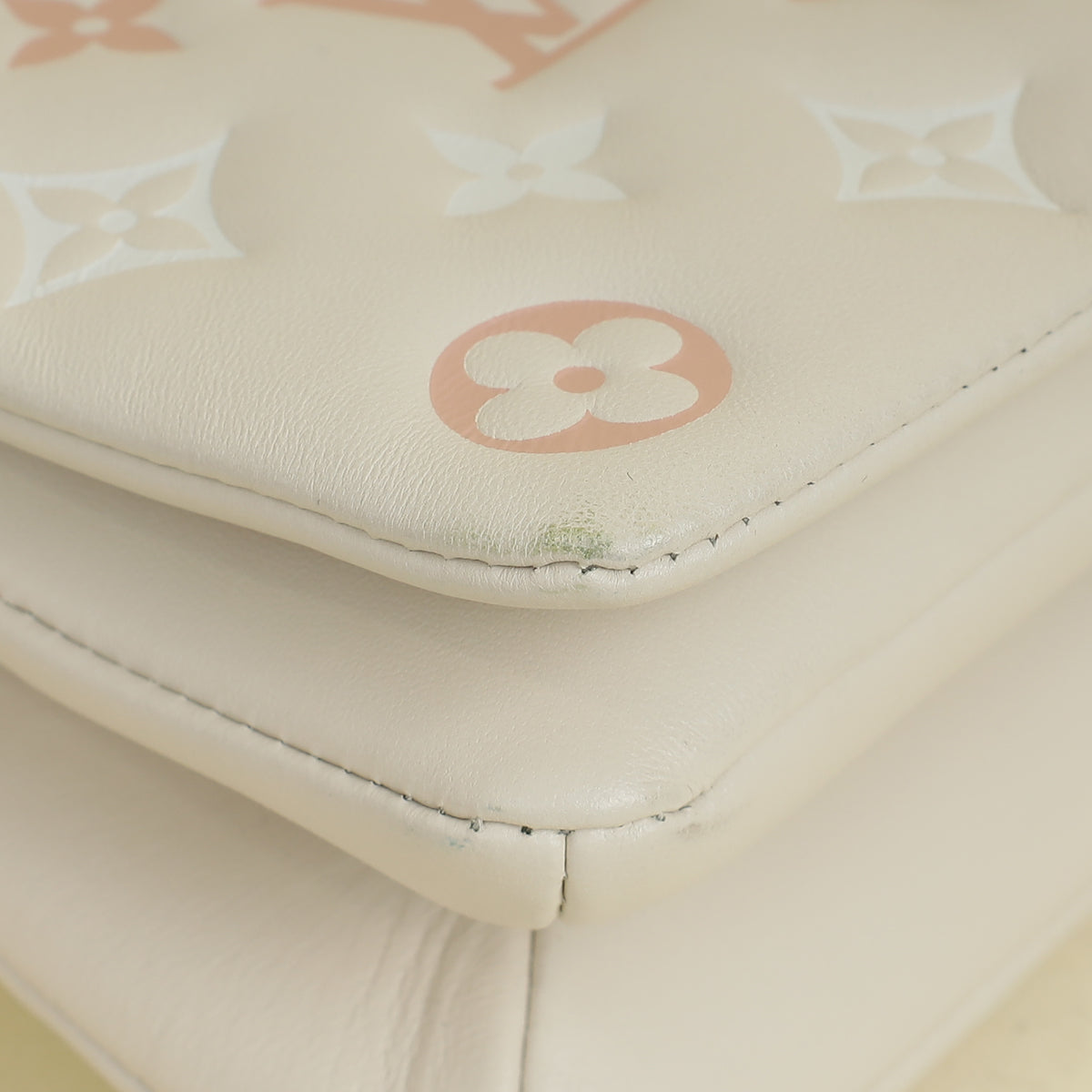 Louis Vuitton Creme Monogram-Embossed Pochette Coussin Bag
