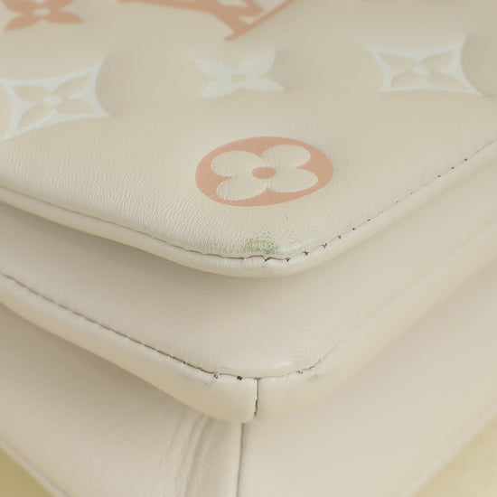 Louis Vuitton Creme Monogram-Embossed Pochette Coussin Bag