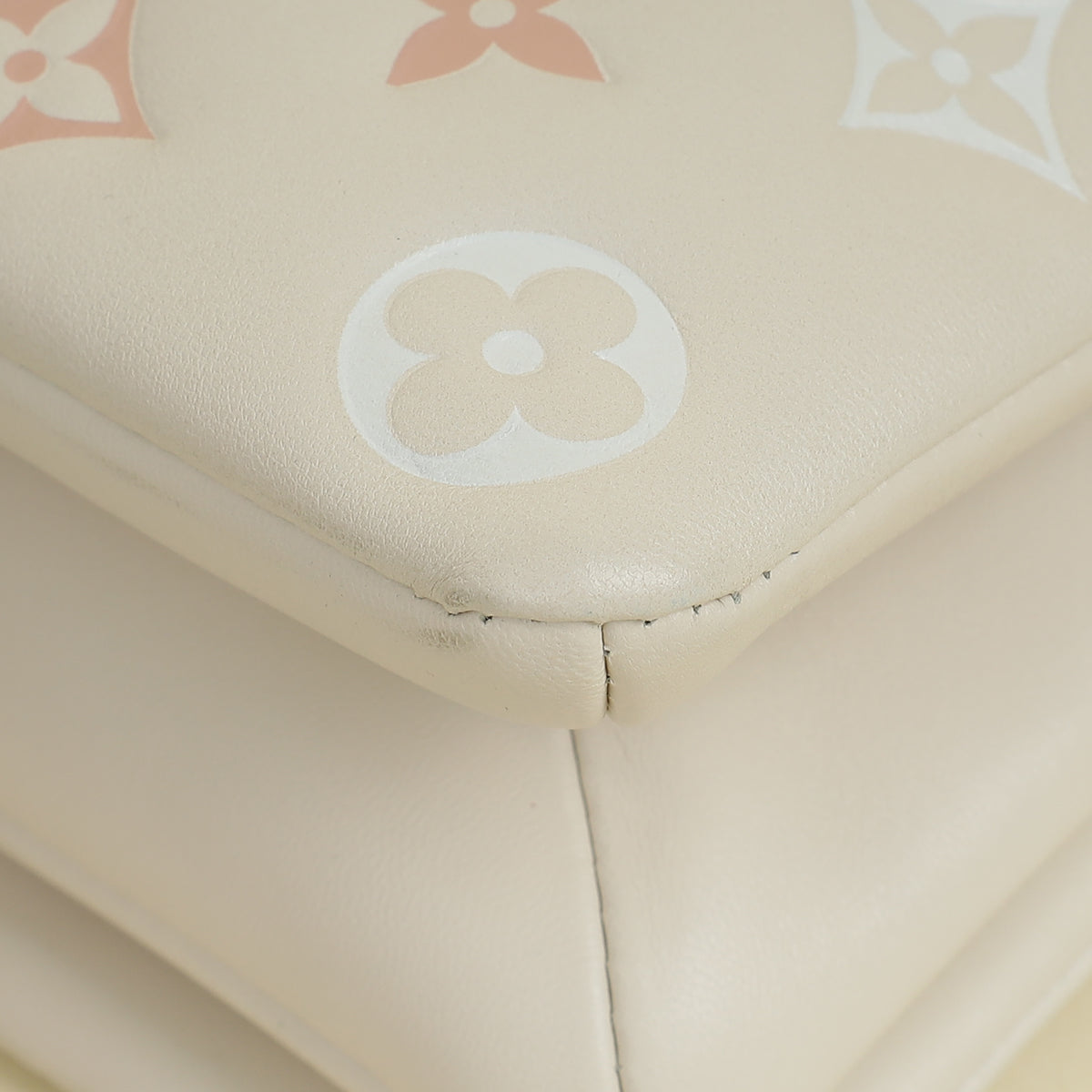 Louis Vuitton Creme Monogram-Embossed Pochette Coussin Bag