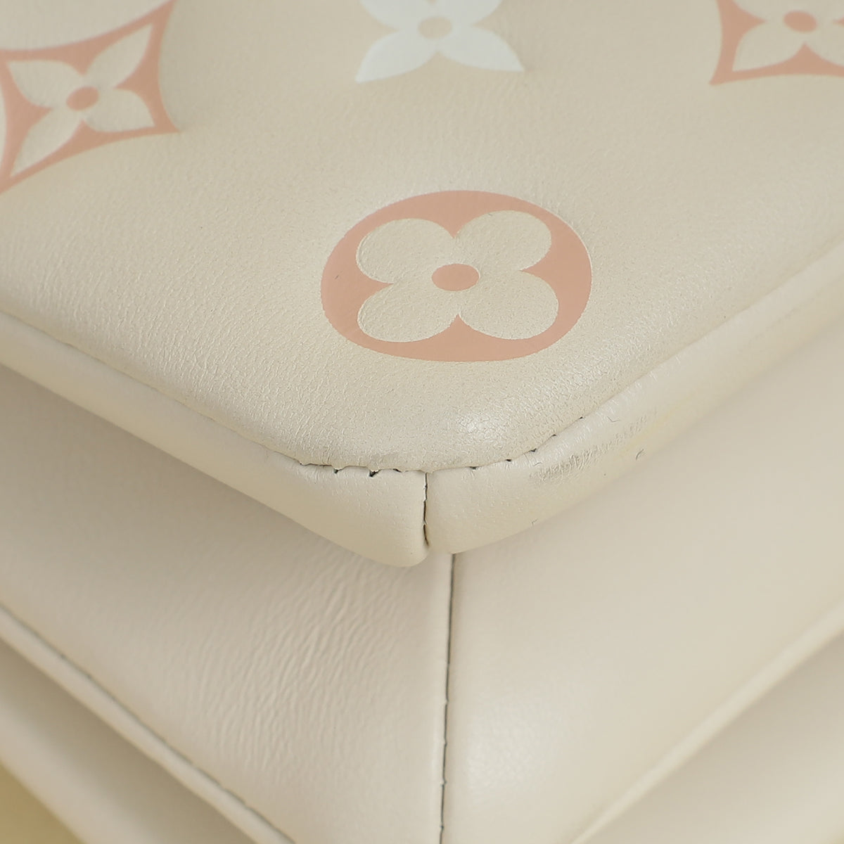 Louis Vuitton Creme Monogram-Embossed Pochette Coussin Bag