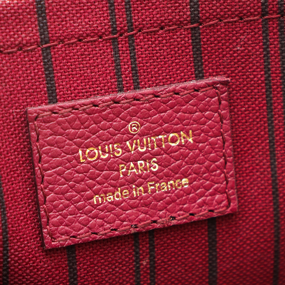 Louis Vuitton Grape Monogram Empreinte Montaigne MM Bag