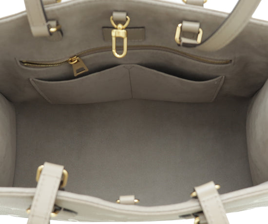 Louis Vuitton Bicolor Monogram Empreinte Leather Giant Onthego MM Bag Louis  Vuitton