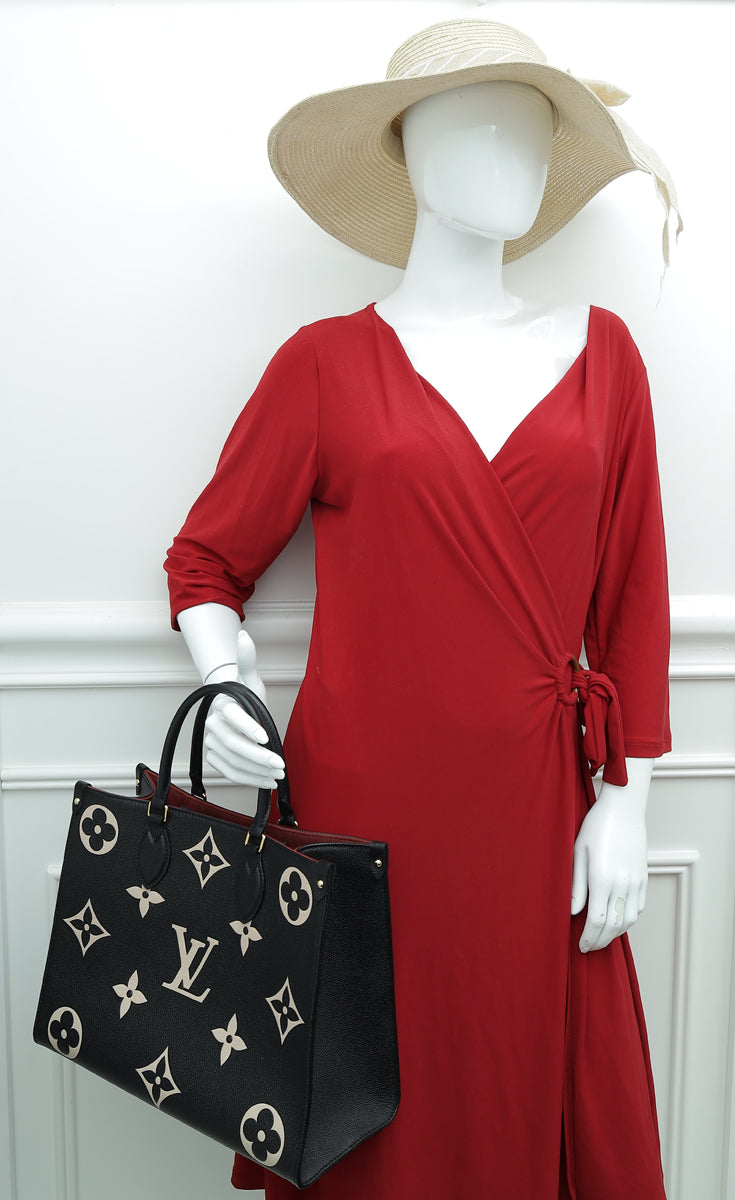 Louis Vuitton Brown Monogram Empreinte OnTheGo MM Pink Beige Leather  ref.994153 - Joli Closet