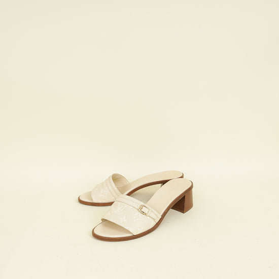Louis Vuitton Cream Monogram Empreinte Lockit Mules 40