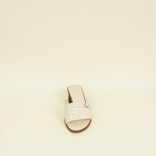 Louis Vuitton Cream Monogram Empreinte Lockit Mules 40