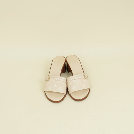 Louis Vuitton Cream Monogram Empreinte Lockit Mules 40