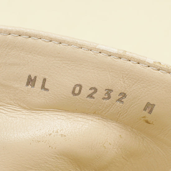 Louis Vuitton Cream Monogram Empreinte Lockit Mules 40