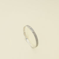 Messika 18K White Gold 3 Diamonds Move Noa Chiseled Medium Bangle