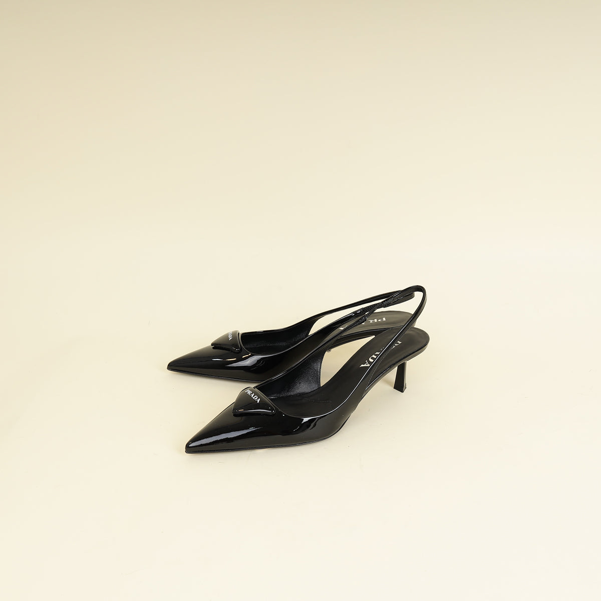 Prada Black Triangle Logo Slingback 55mm Pumps-Prada-THE CLOSET