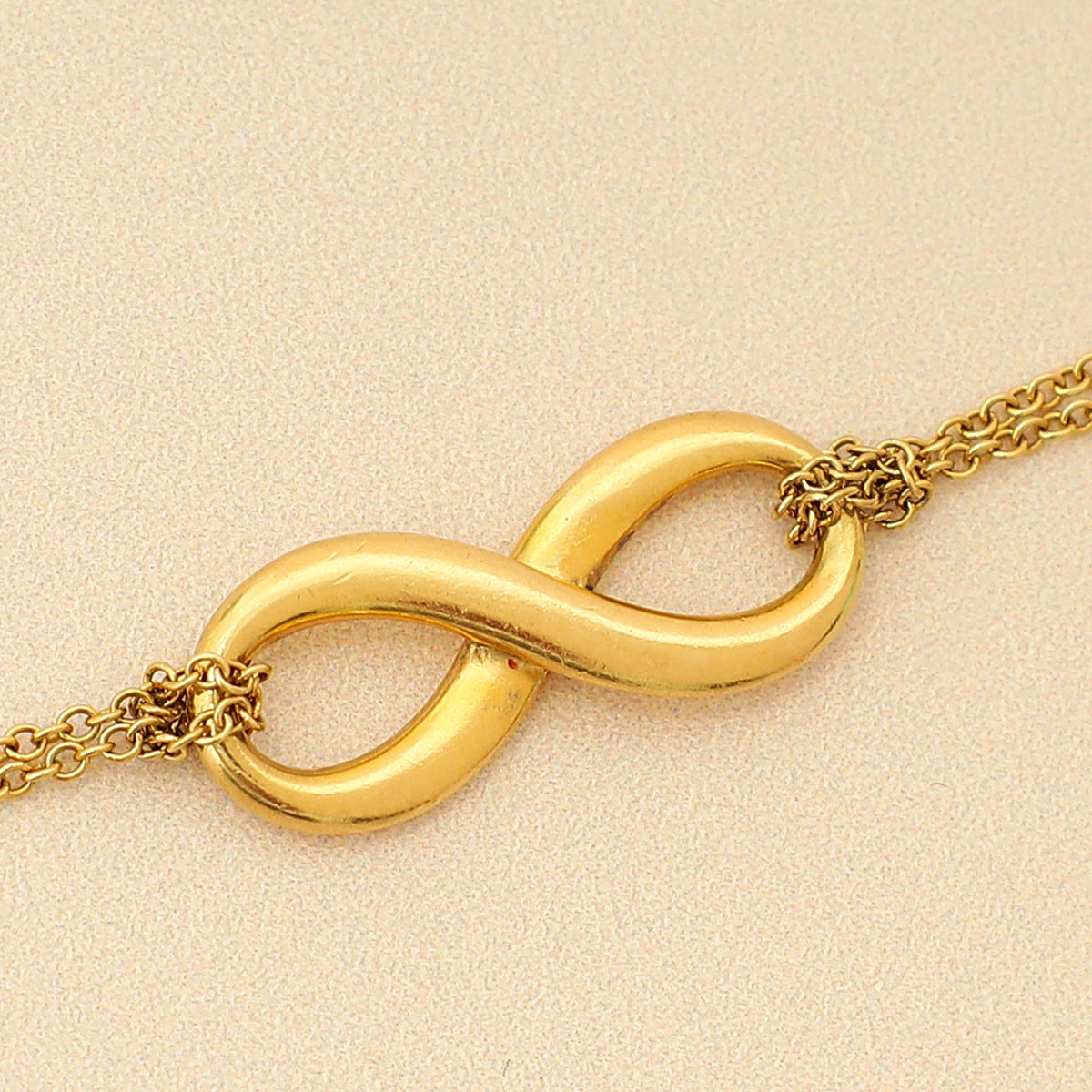 Tiffany & Co. 18K Yellow Gold Infinity Bracelet-Tiffany & Co-THE CLOSET