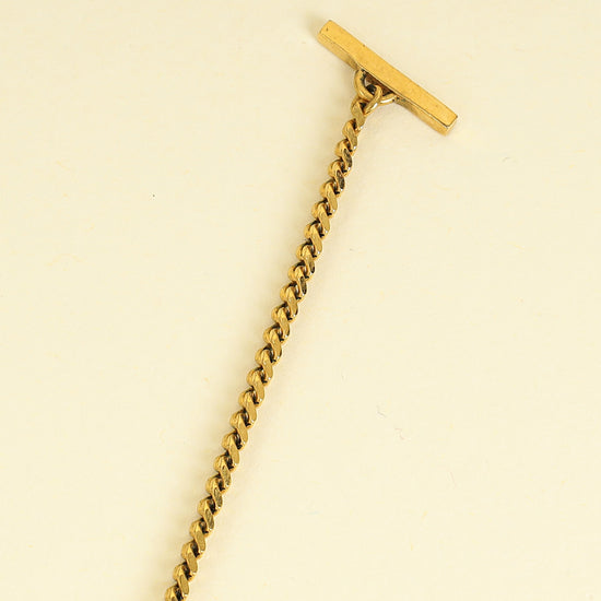 YSL Gold Brass Snake Monogram Tassel Pendant Necklace