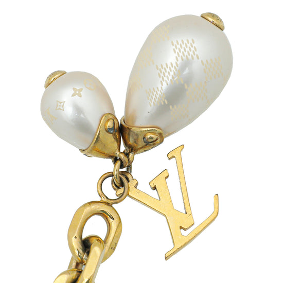 Louis Vuitton Gold Tone Resin Pearls Essential V Perle Bracelet at 1stDibs   lv bracelet pearl, louis vuitton pearl bracelet, louis vuitton v bracelet  gold