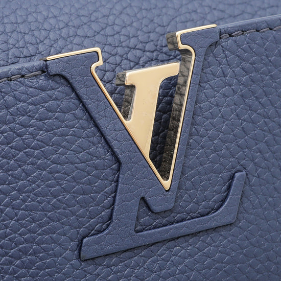 A Louis Vuitton 'Very' Blue Leather Tote Bag. Python tri…