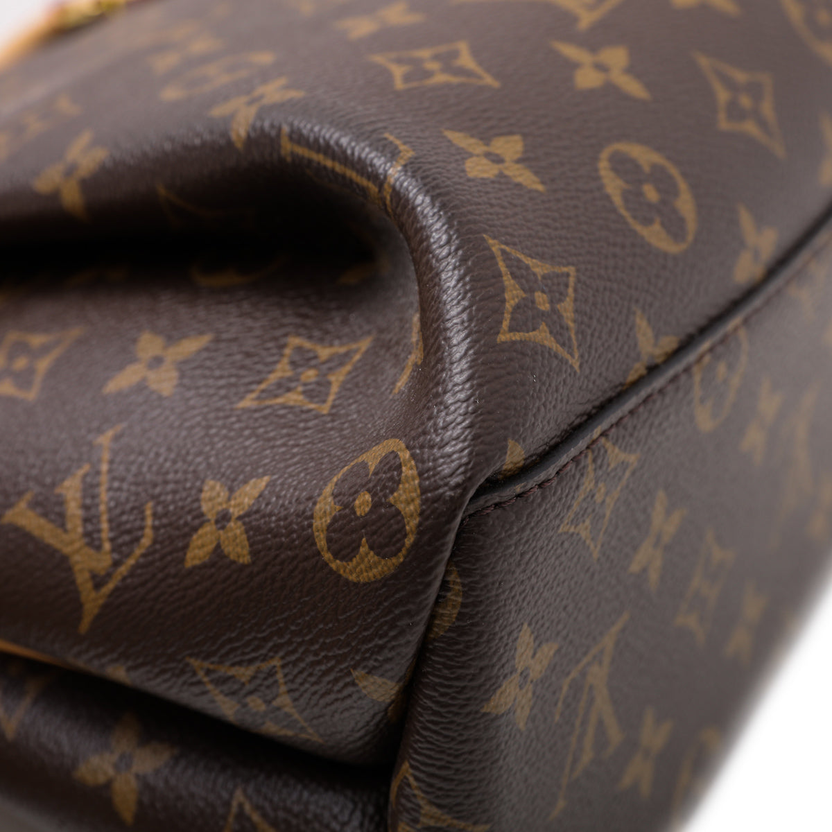 Louis Vuitton LV Rivoli PM monogram Brown Cloth ref.966124 - Joli
